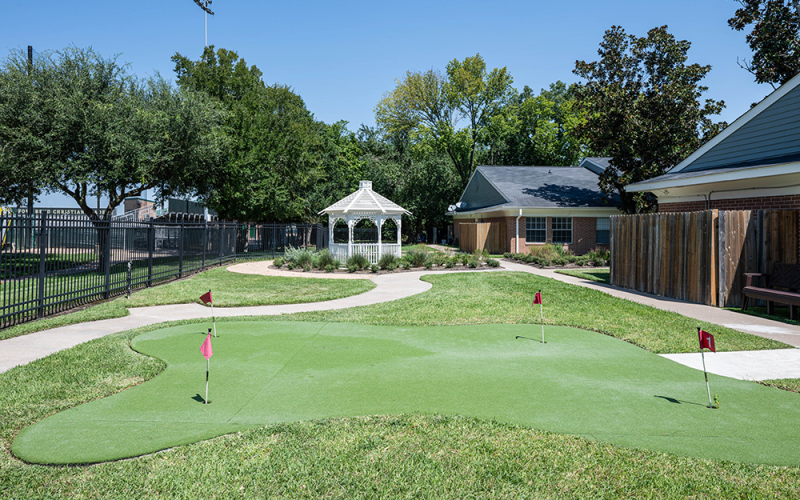 a putting green with gazebo